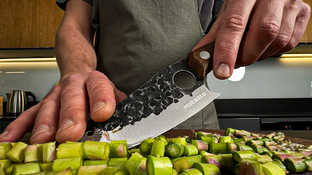 Home cook using knife